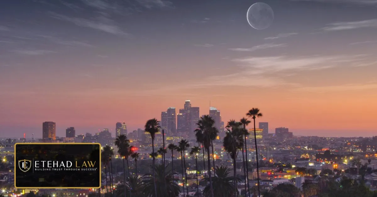 Downtown Los Angeles skyline and palm trees at sunset, representing brain injury settlements in California