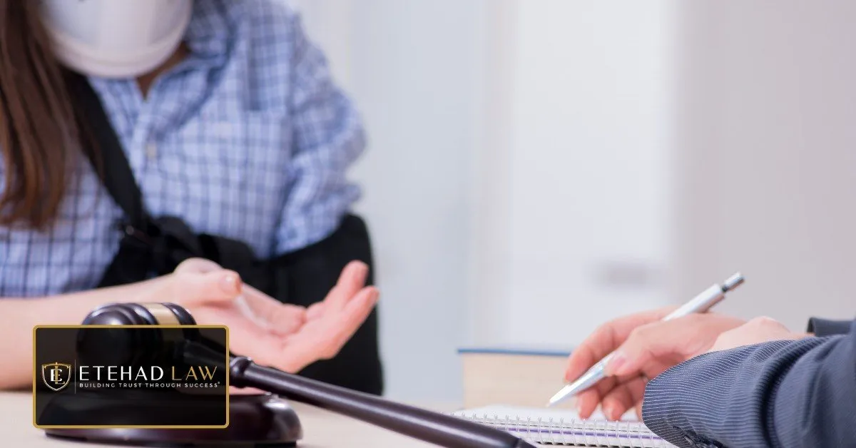 Injured accident victim consulting with an attorney about a personal injury claim – Etehad Law.