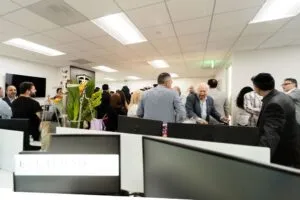 Guests gathered near the reception desk at the Etehad Law Rodeo Drive office opening