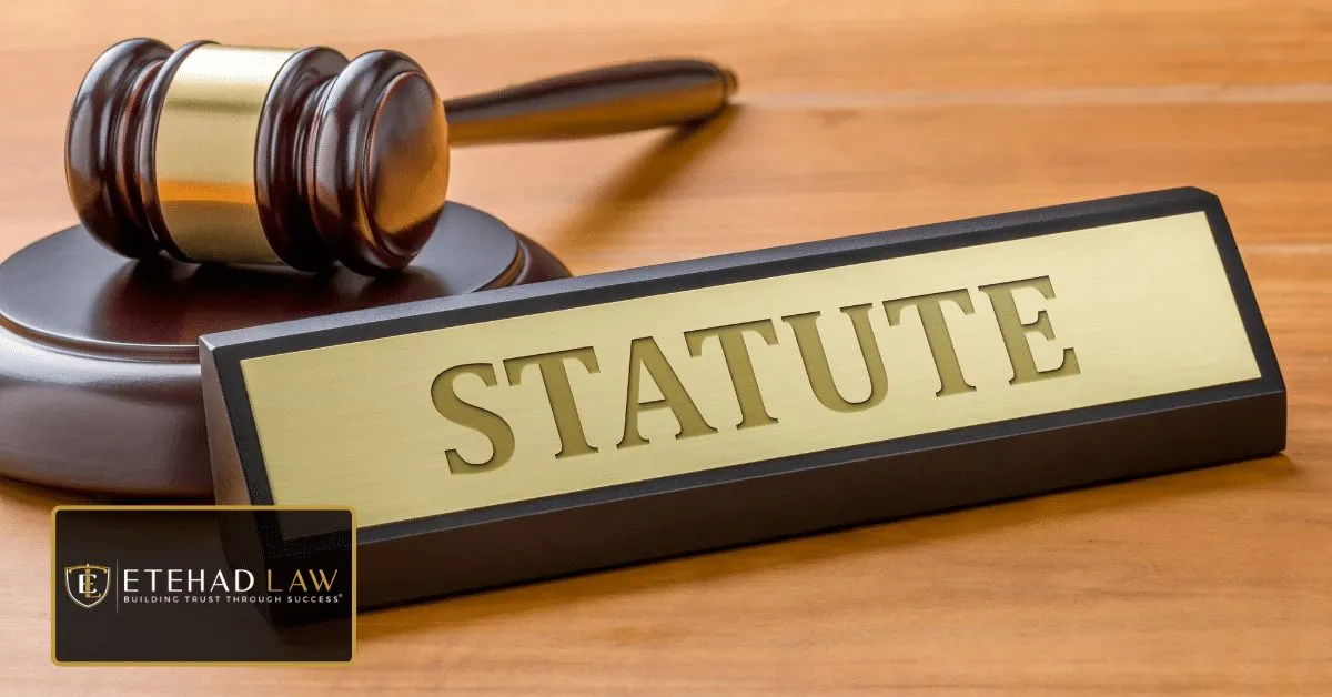 Personal injury attorney's desk with case files and scales of justice