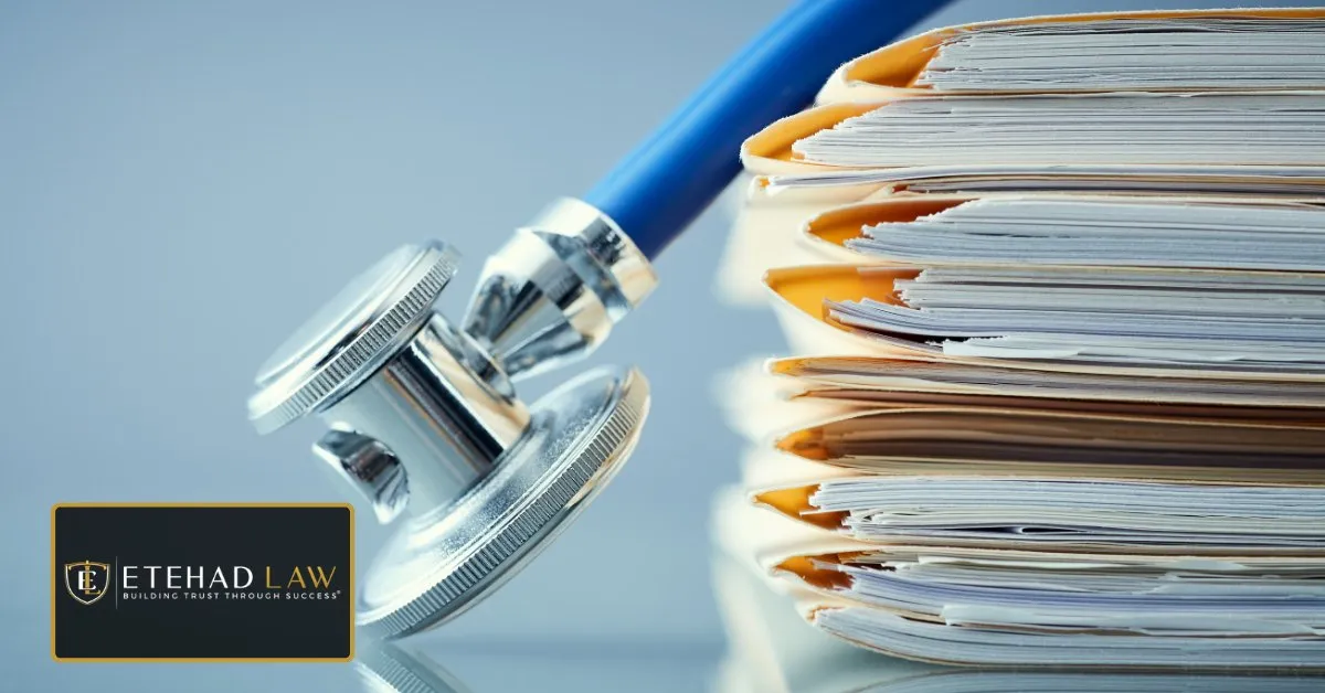 Stethoscope resting beside a tall stack of patient medical record folders