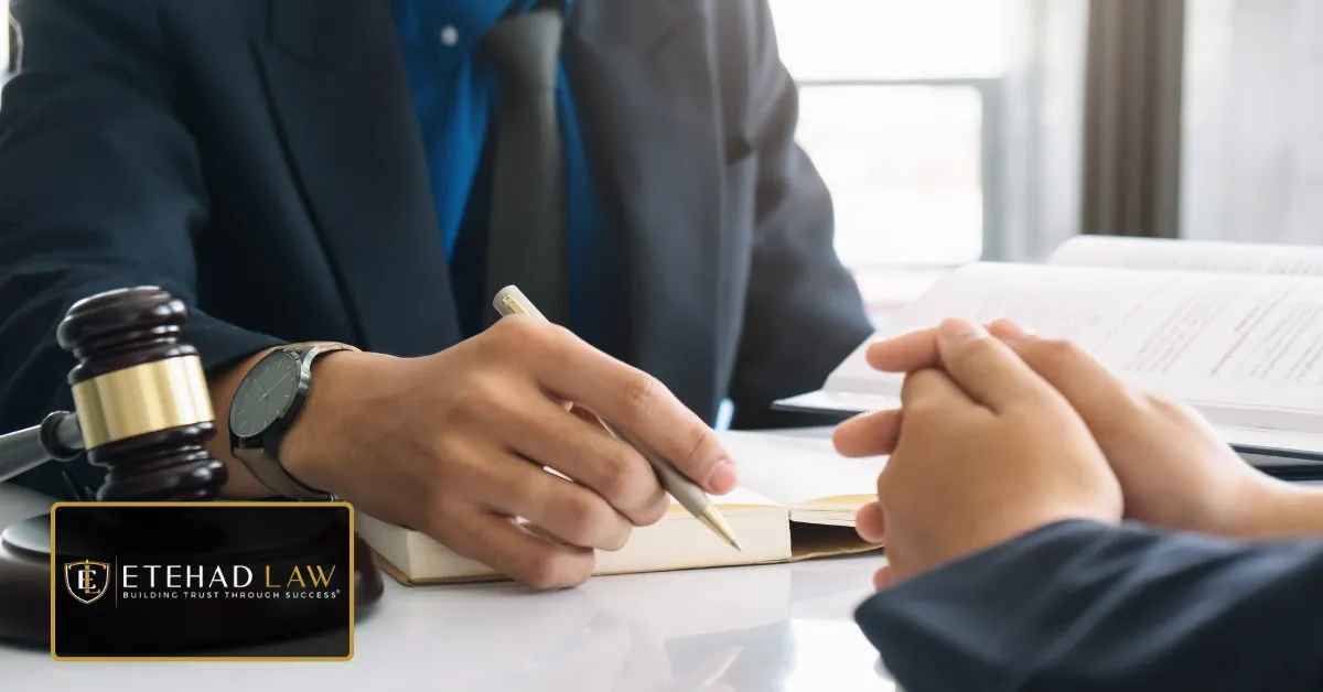 Attorney consulting with a client about an accident and insurance claim – Etehad Law.