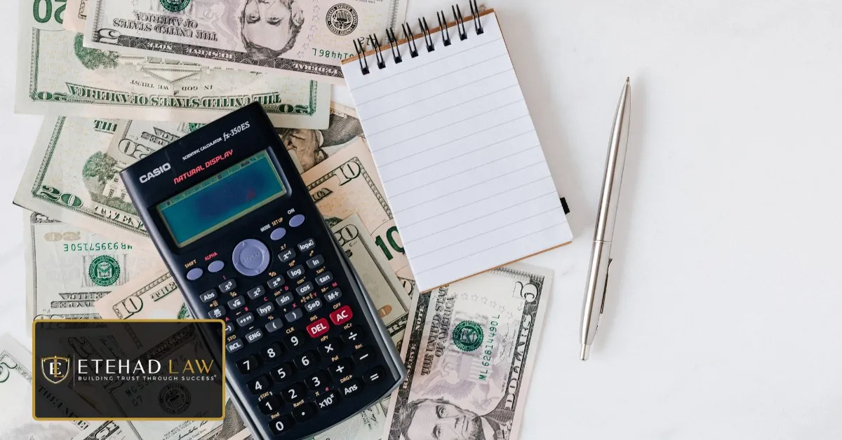 Calculator and medical bills used to total accident-related medical expenses