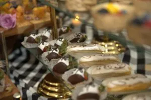 Dessert display of pastries and cakes at the grand opening reception