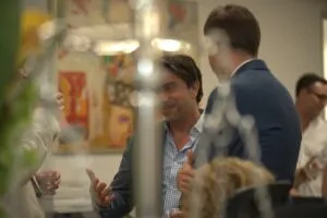 Guests giving a thumbs up during the opening party
