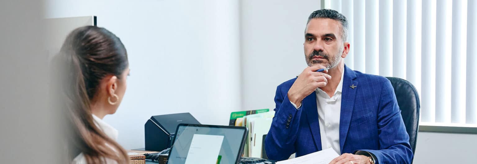 Simon Etehad meeting with a client at the Etehad Law office in Beverly Hills